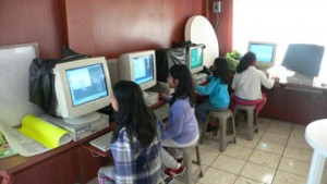 La Pedrera students using computers supplied by LPSP.