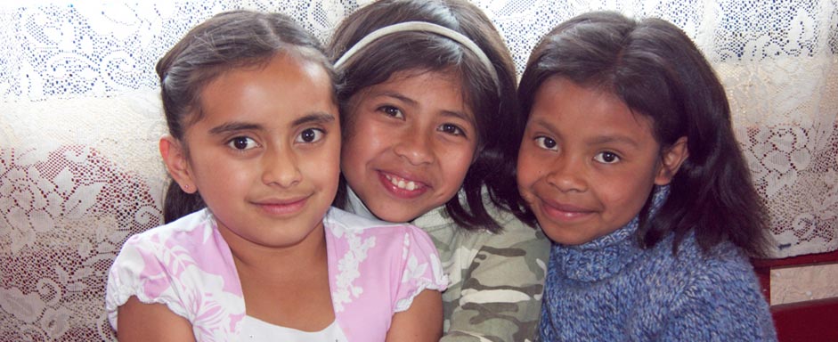 three girls in La Pedrera classroom